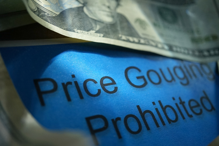 Money with price gouging prohibited displayed
